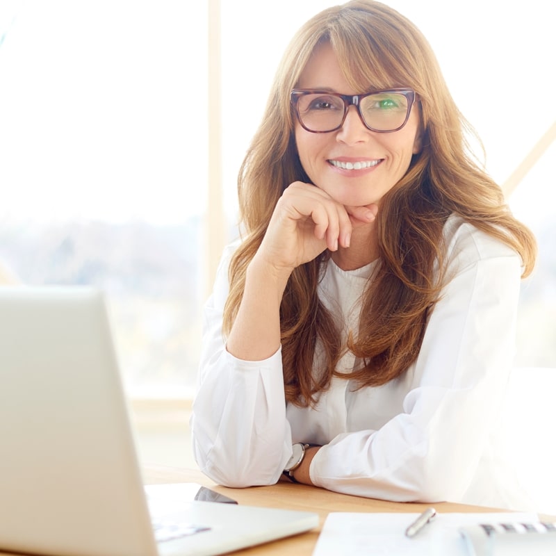 Businesswoman sitting front laptop